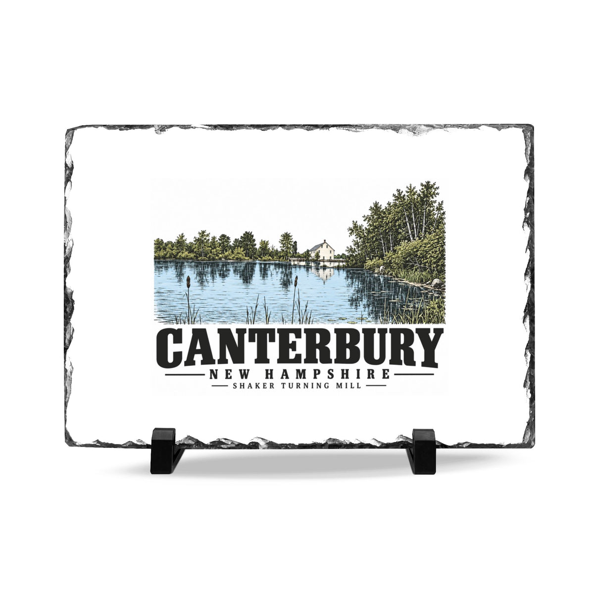 Front on display stands of Shaker Turning Mill slate desk plaque, with Canterbury, New Hampshire artwork and lettering.