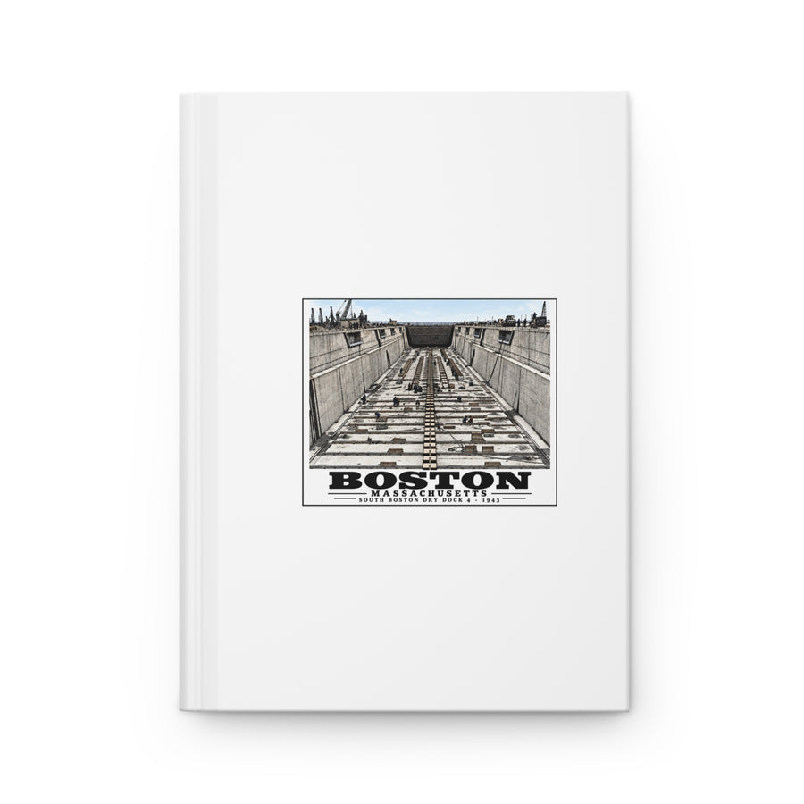 White hardcover journal with naval dry dock with concrete walls and rows of floor blocks artwork and Boston lettering
