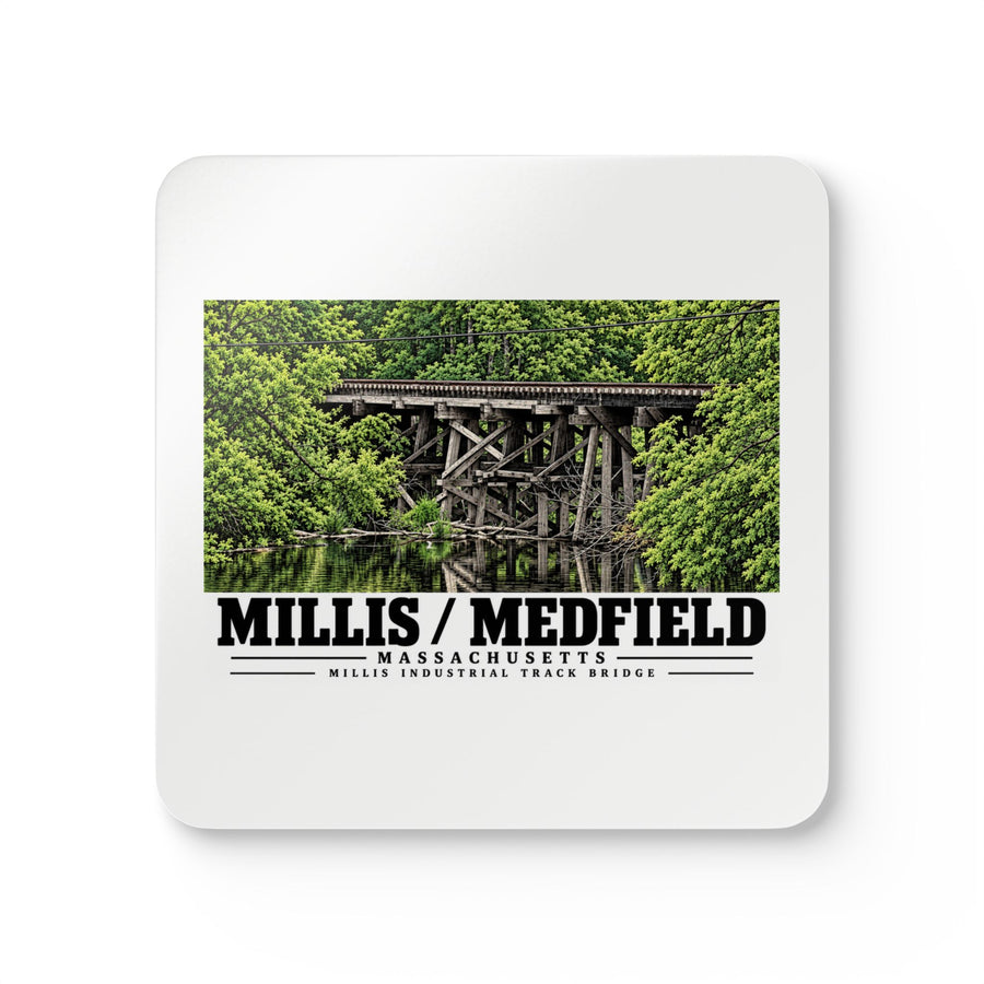 White square coaster showing Millis Industrial Track wooden railway trestle and green foliage artwork and Millis/Medfield lettering
