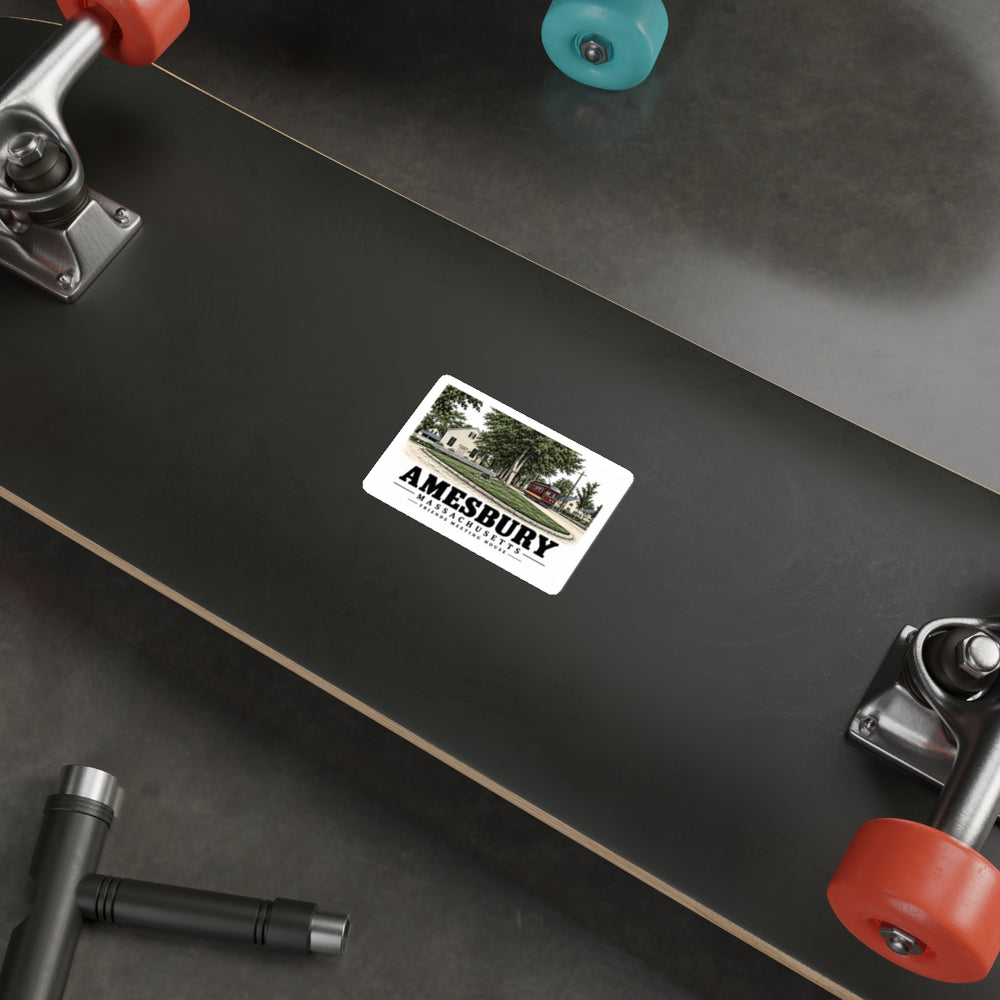 Skateboard display of Friends Meeting House white die-cut sticker, with Amesbury, Massachusetts artwork and lettering.