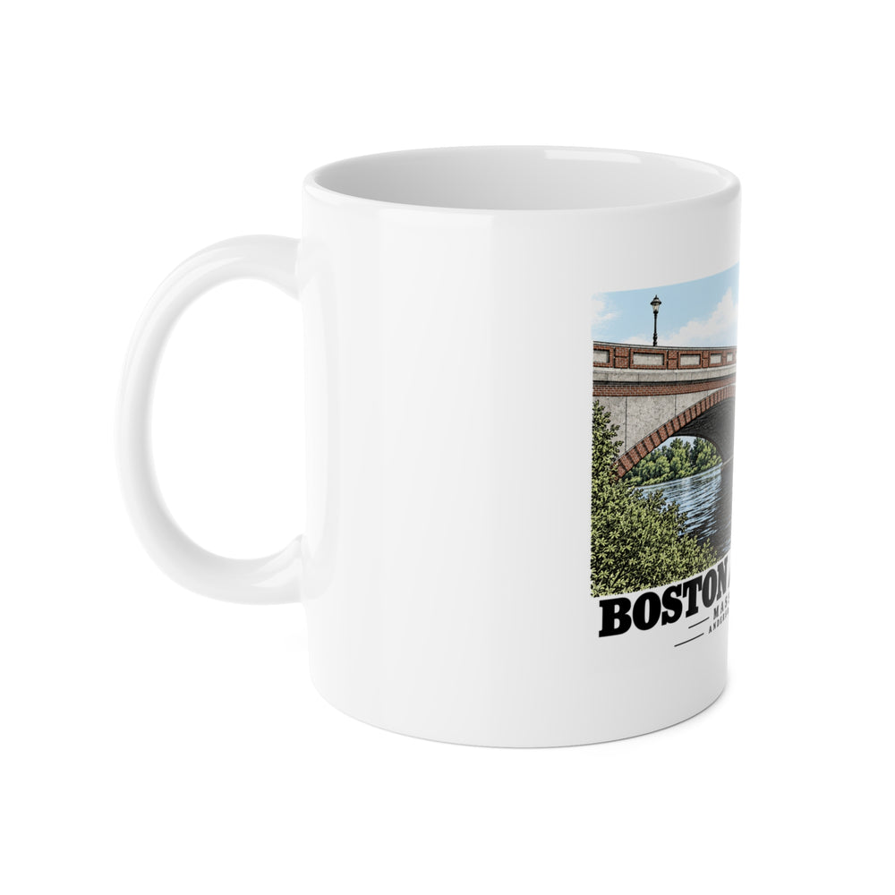White mug with handle at left and part of the Anderson Memorial Bridge close arch view print at right
