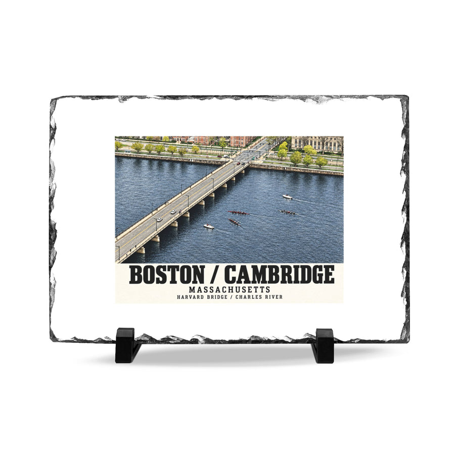 Rough-edged slate display on two black stands with Harvard Bridge aerial view with scullers on the Charles River artwork and Boston/Cambridge lettering