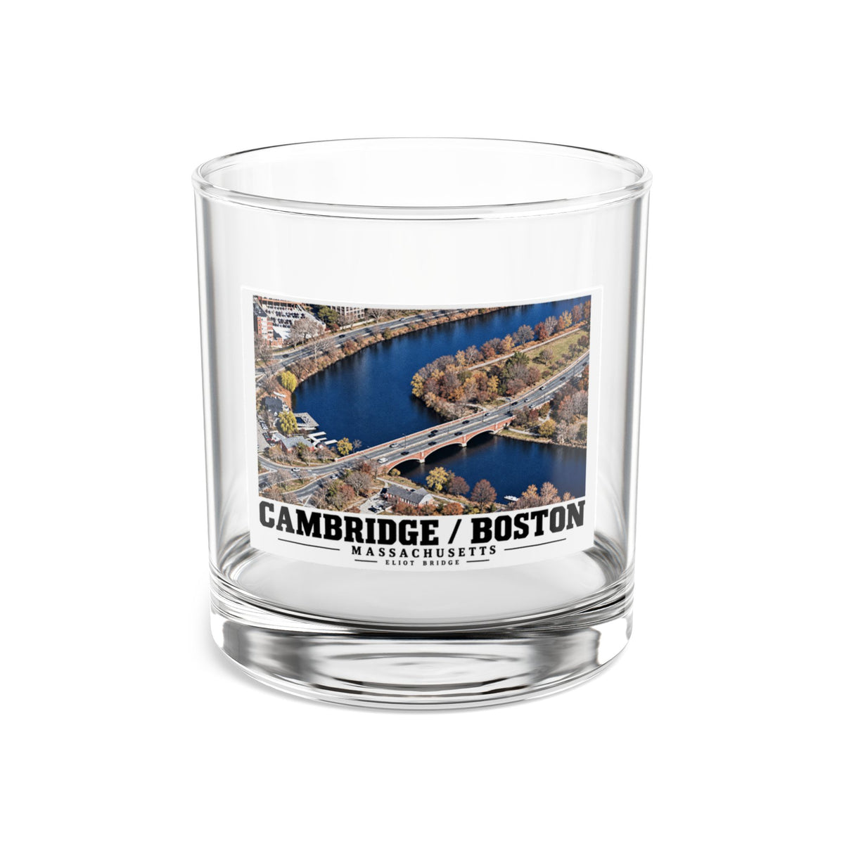 Clear rocks glass showing Eliot Bridge aerial river view artwork and Cambridge/Boston lettering