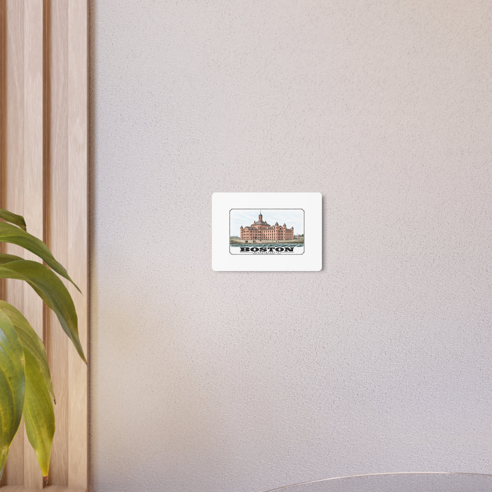 large symmetrical alms house building, grounds and figures metal print on a beige wall beside a plant