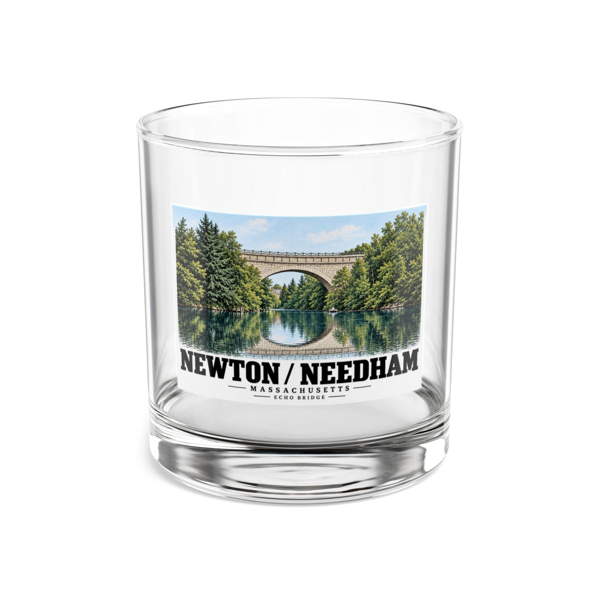 Clear rocks glass showing Echo Bridge landscape artwork and Newton/Needham lettering