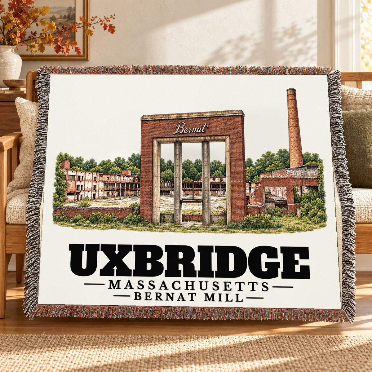 Bernat Mill woven blanket draped on a sofa in a living room — Uxbridge, Massachusetts