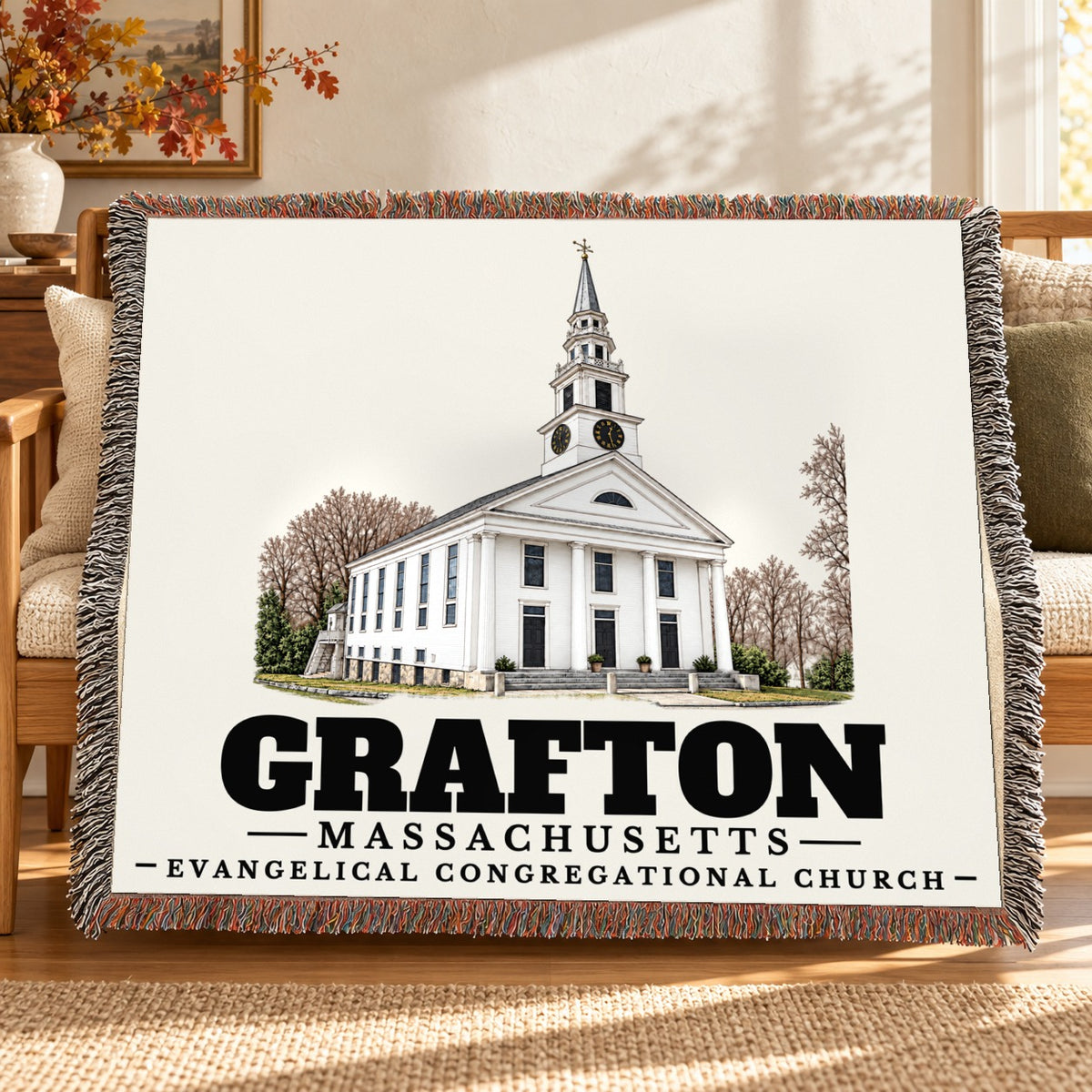 Evangelical Congregational Church woven blanket draped on a sofa in a living room — Grafton, Massachusetts