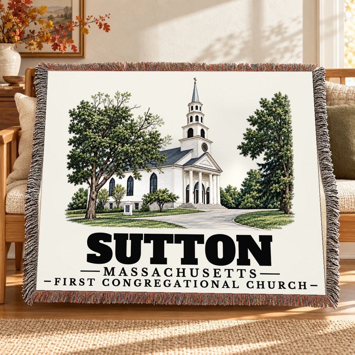 First Congregational Church woven blanket draped on a sofa in a living room — Sutton, Massachusetts