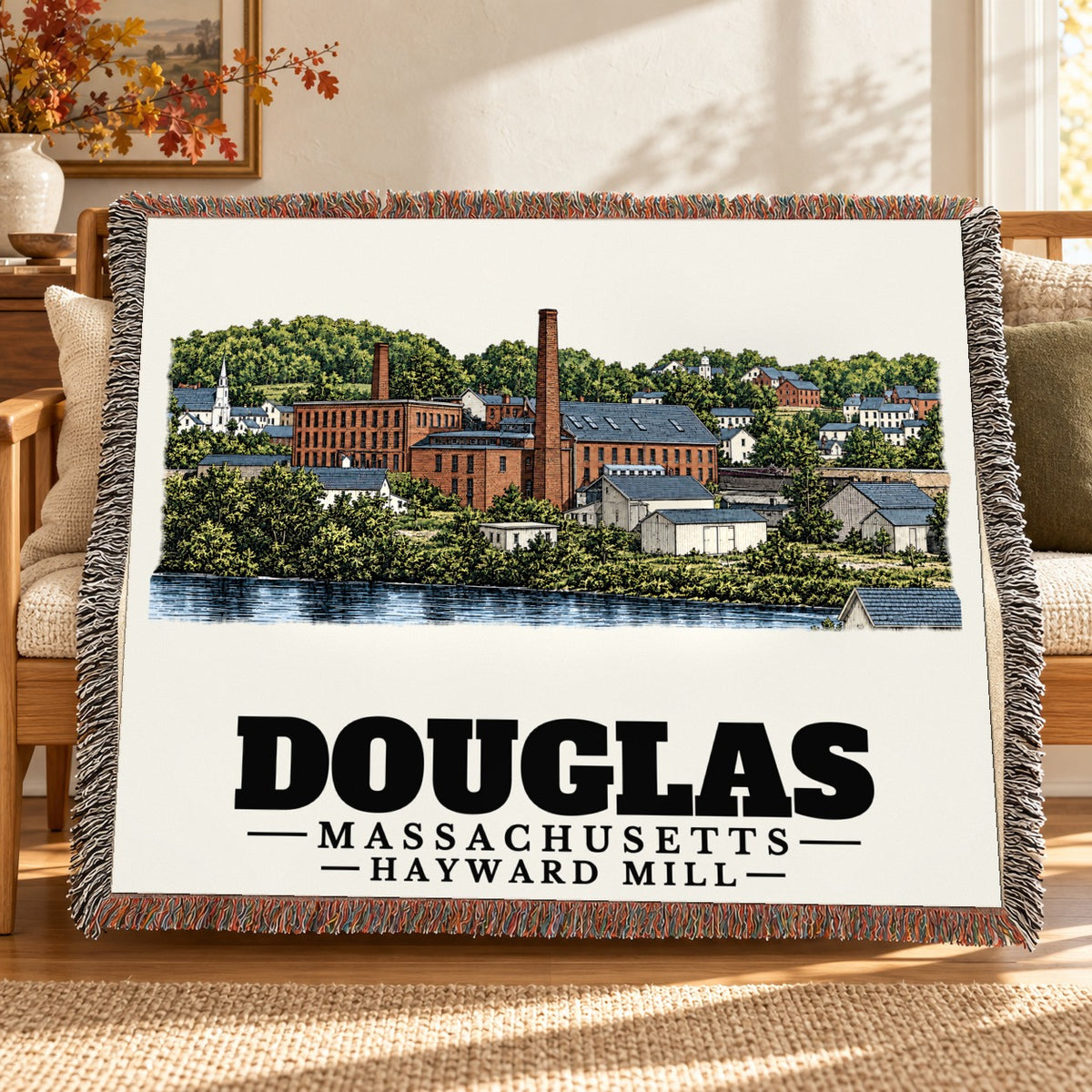 Hayward Mill woven blanket draped on a sofa in a living room — Douglas, Massachusetts