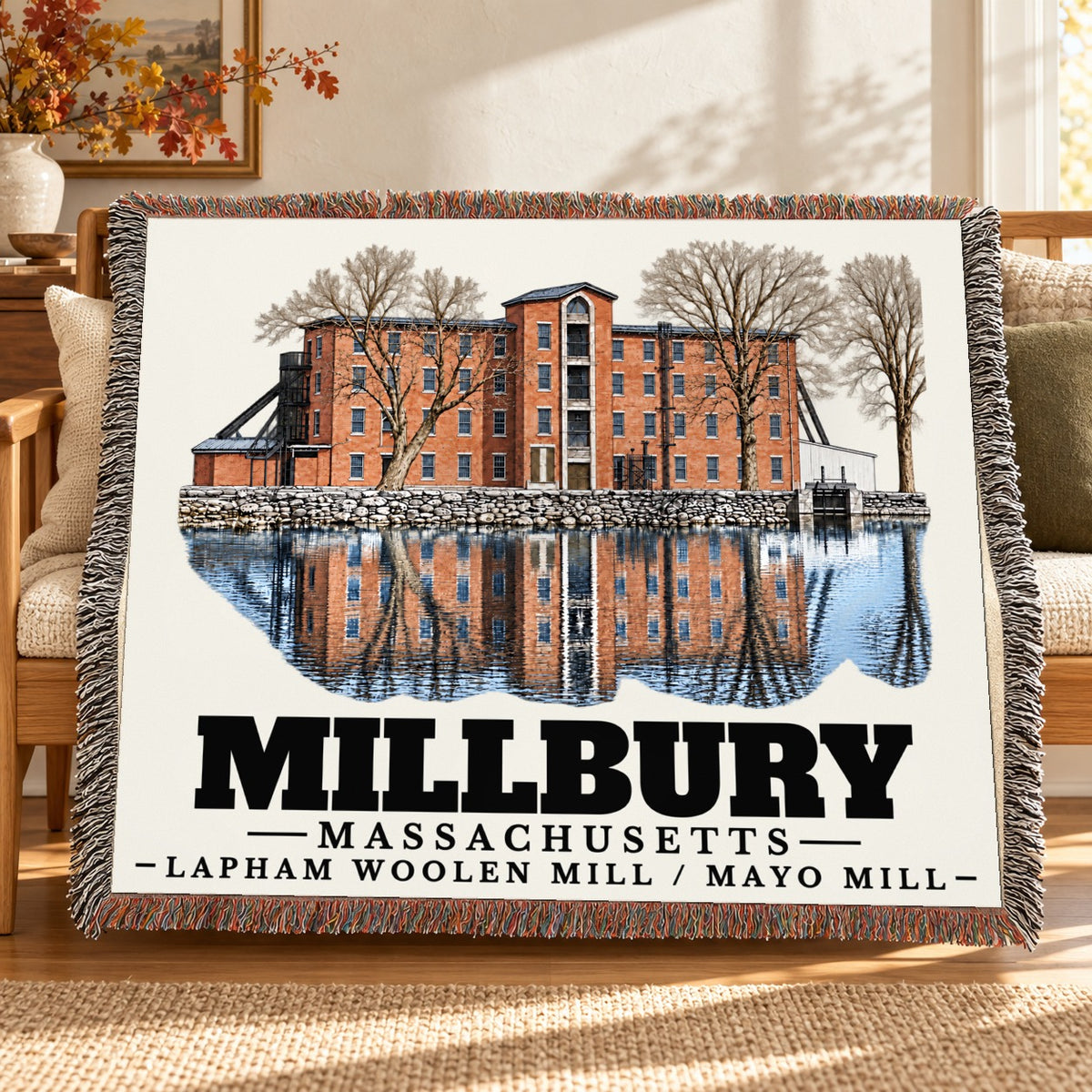 Lapham Woolen Mill / Mayo Mill woven blanket draped on a sofa in a living room — Millbury, Massachusetts