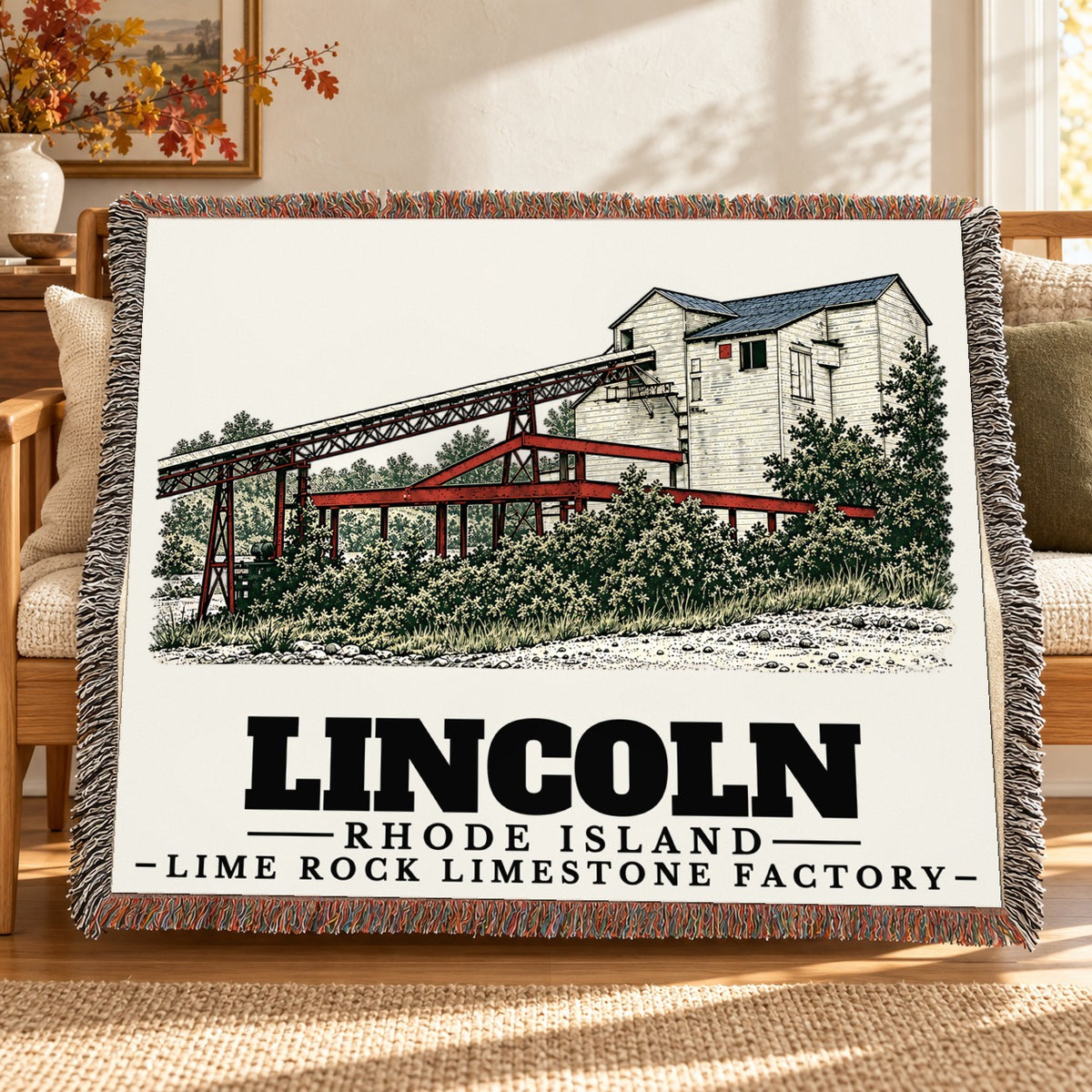 Lime Rock Limestone Factory woven blanket draped on a sofa in a living room — Lincoln, Rhode Island