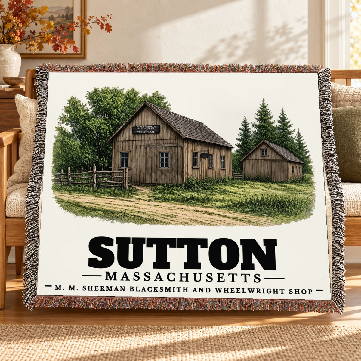 M. M. Sherman Blacksmith and Wheelwright Shop woven blanket draped on a sofa in a living room — Sutton, Massachusetts