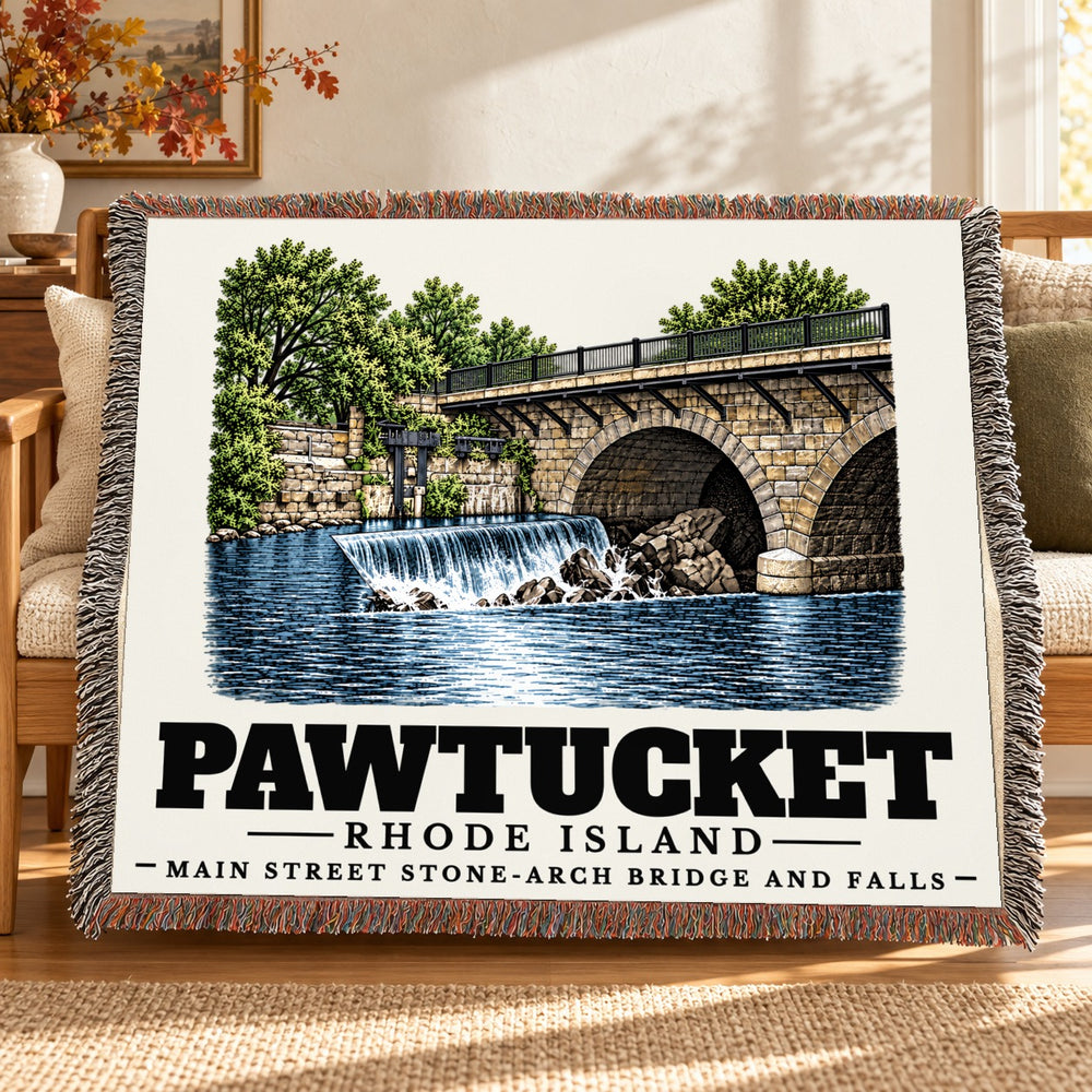 Main Street Stone-Arch Bridge and Falls woven blanket draped on a sofa in a living room — Pawtucket, Rhode Island