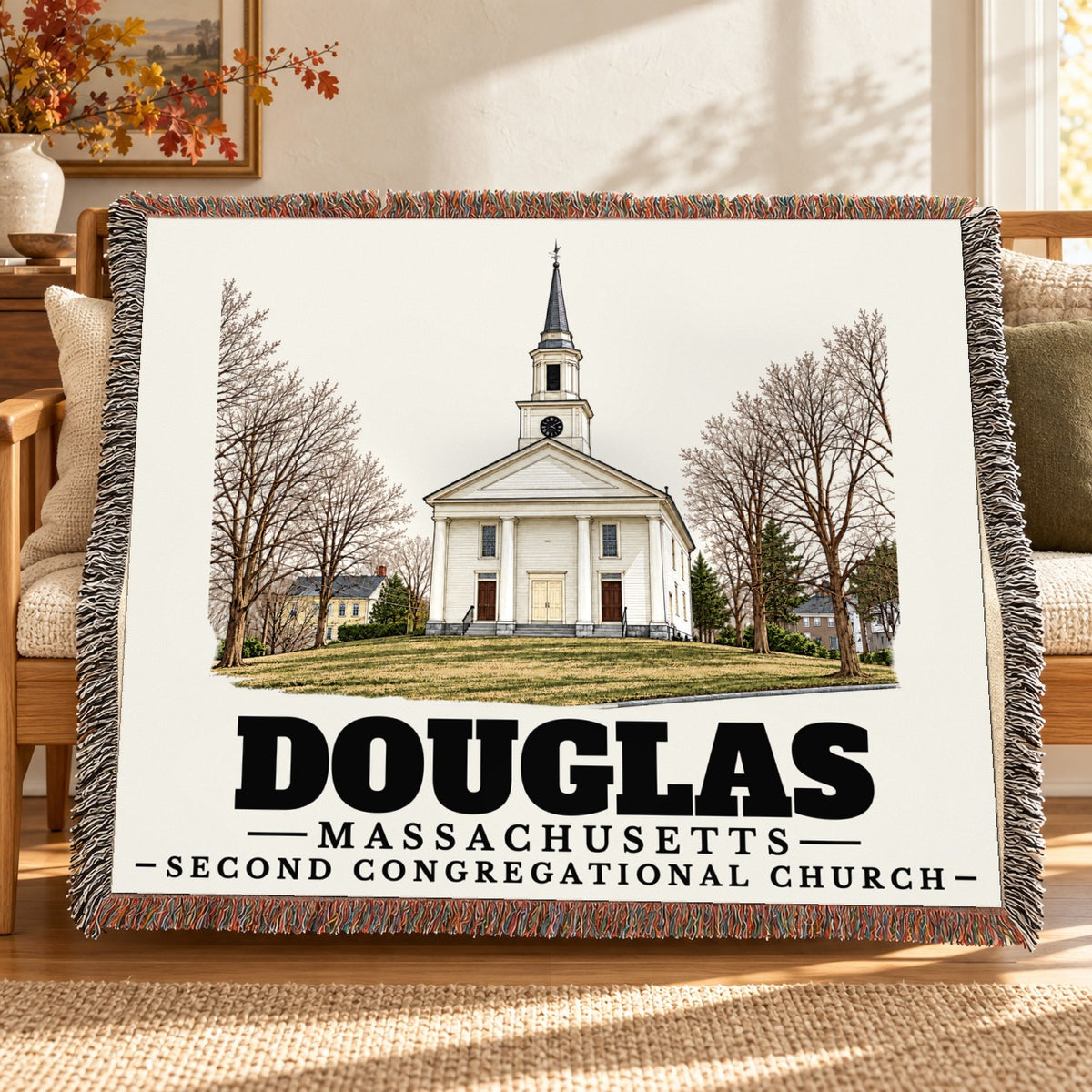 Second Congregational Church woven blanket draped on a sofa in a living room — Douglas, Massachusetts