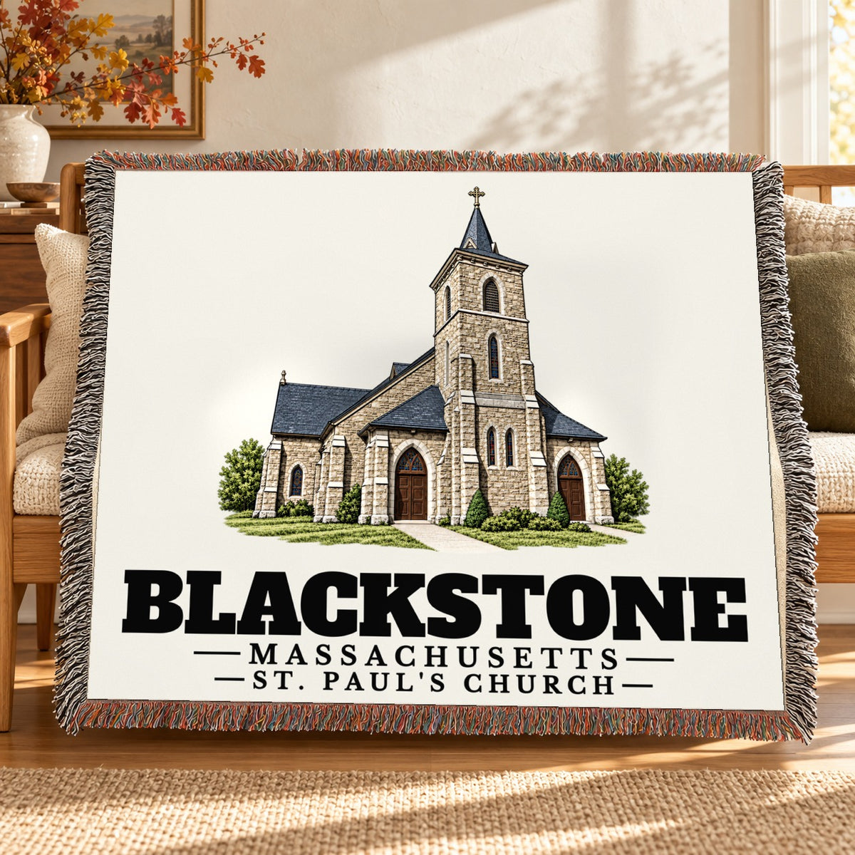 St. Paul's Church woven blanket draped on a sofa in a living room — Blackstone, Massachusetts