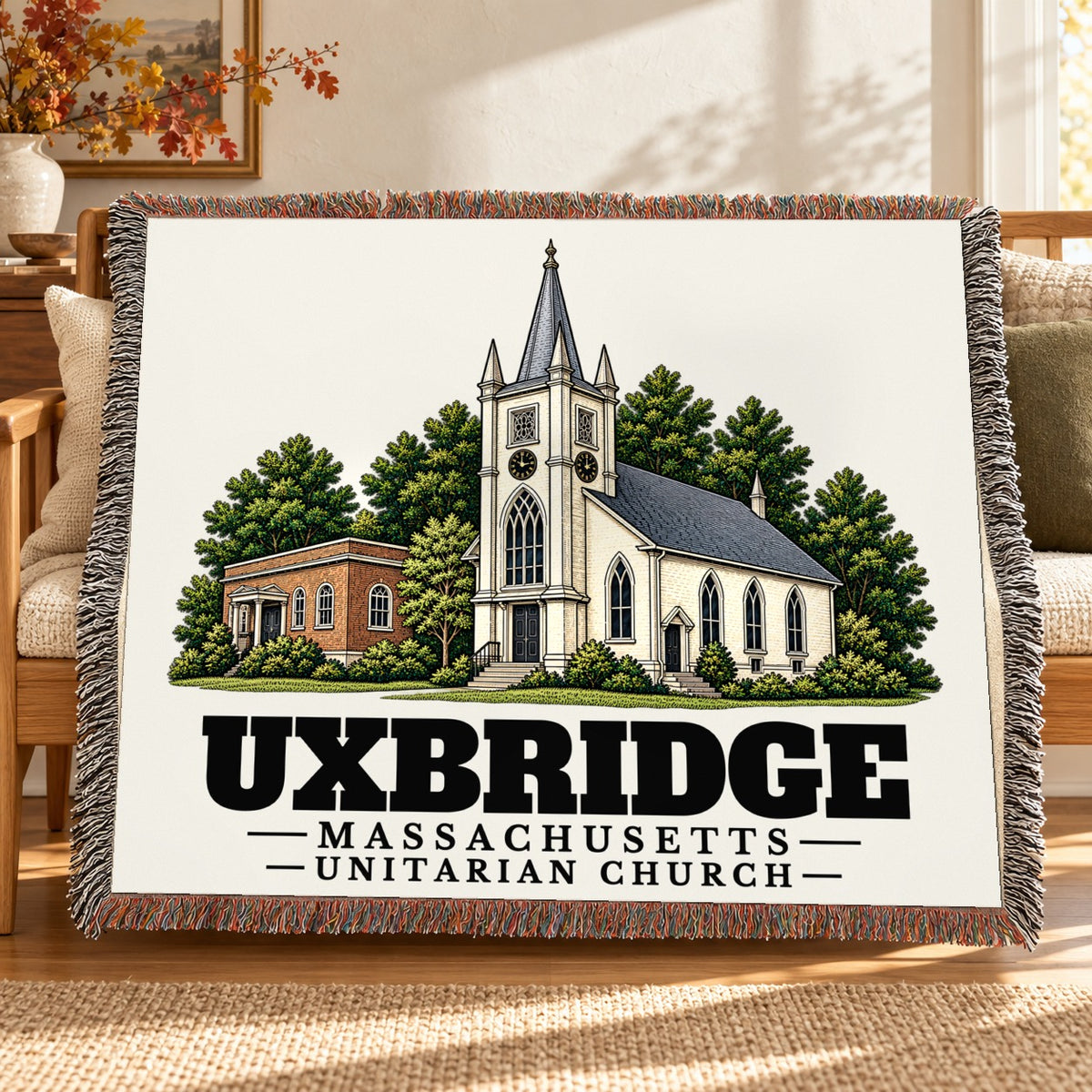 Unitarian Church woven blanket draped on a sofa in a living room — Uxbridge, Massachusetts
