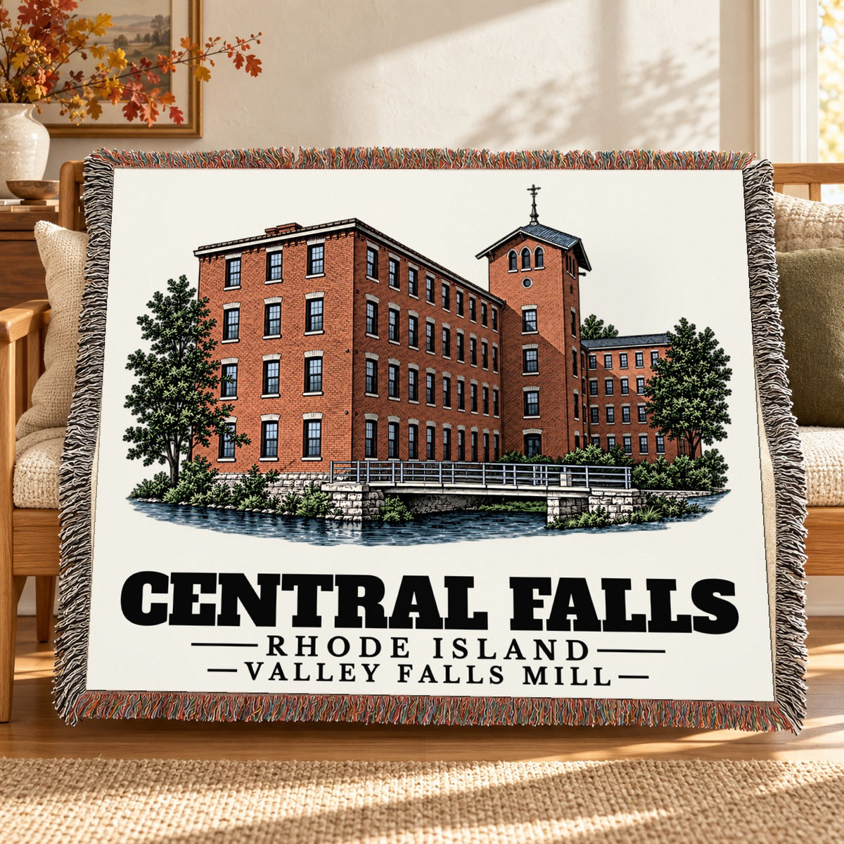 Valley Falls Mill woven blanket draped on a sofa in a living room — Central Falls, Rhode Island