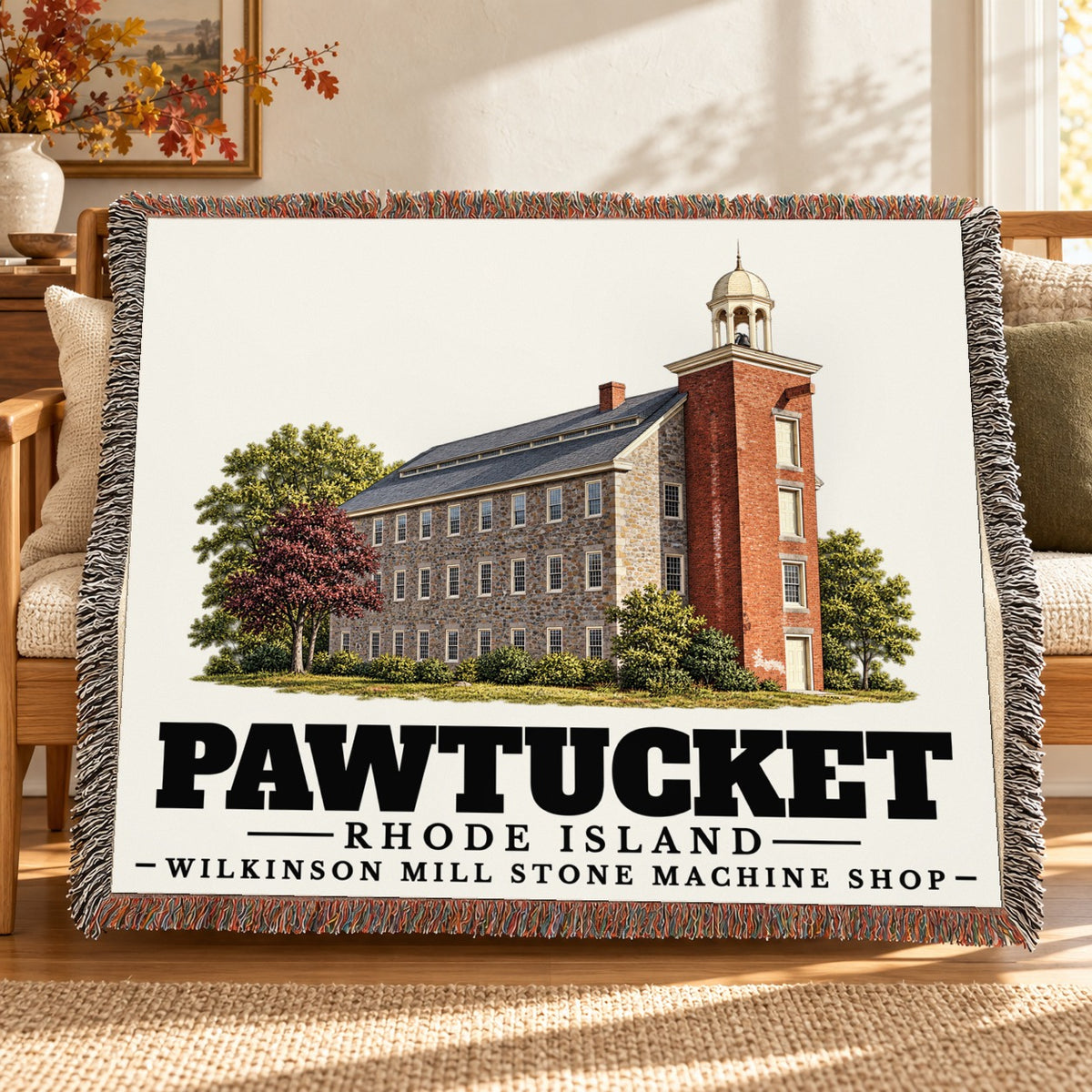 Wilkinson Mill Stone Machine Shop woven blanket draped on a sofa in a living room — Pawtucket, Rhode Island