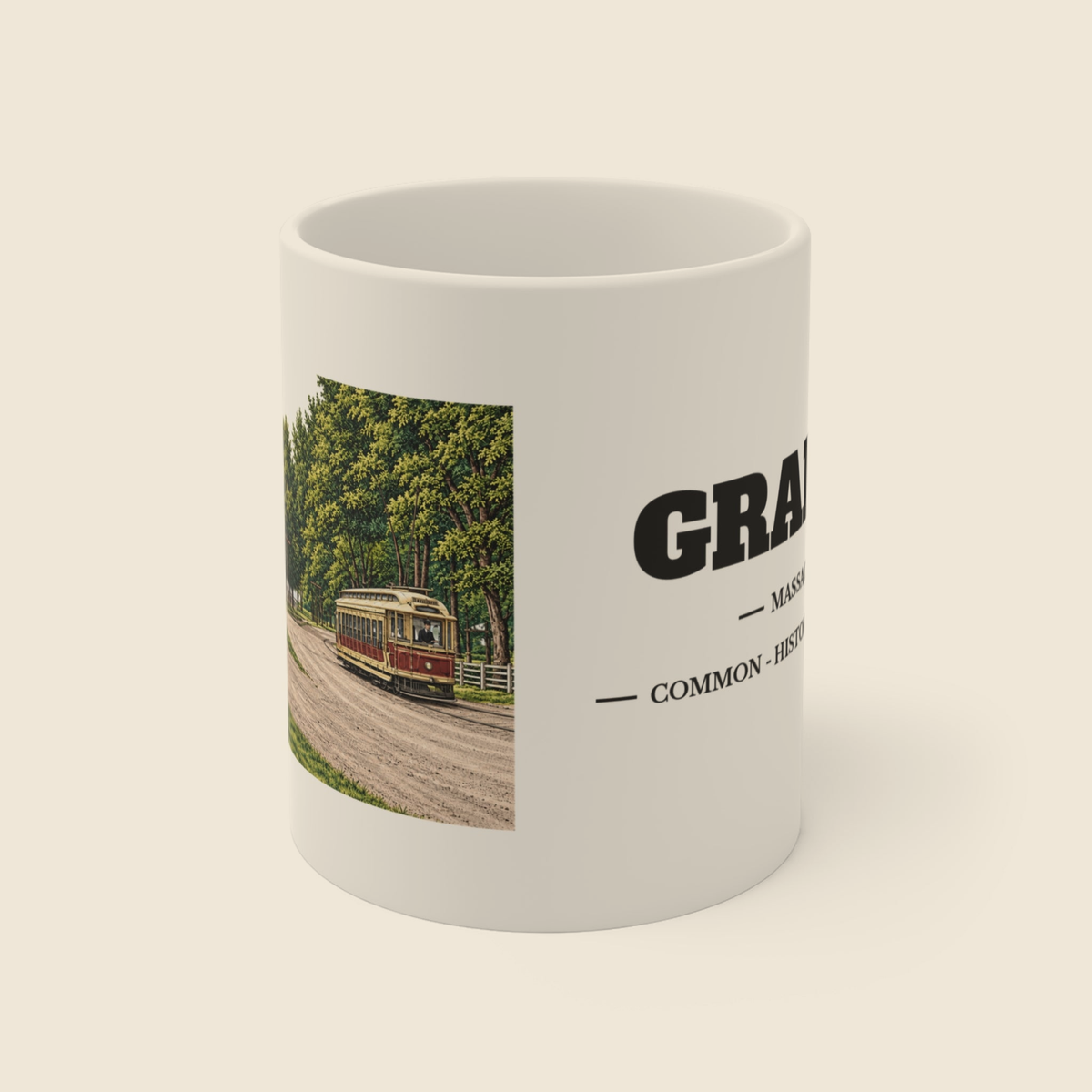 Grafton Common - Historic Streetcar View colored engraving on an 11 oz white ceramic mug, cream display background