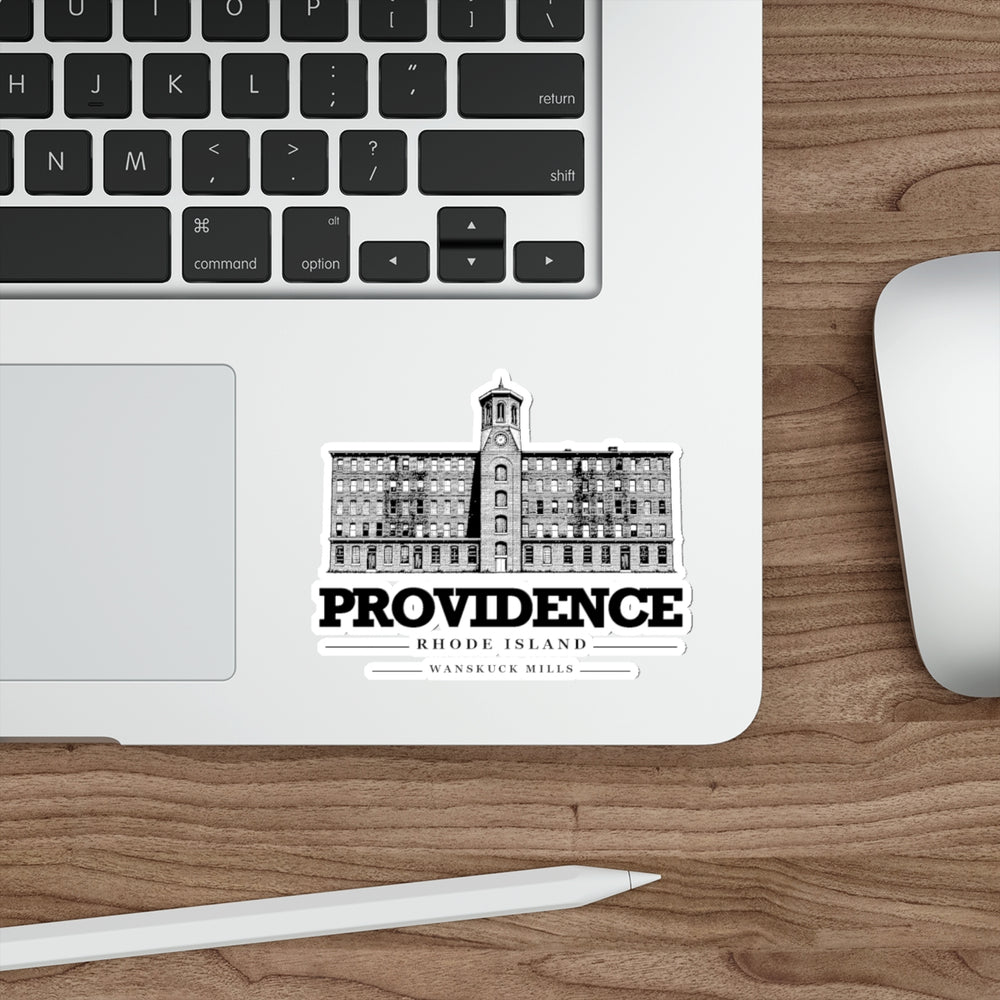 Providence Wanskuck Mills on white four-inch die-cut vinyl sticker, laptop context
