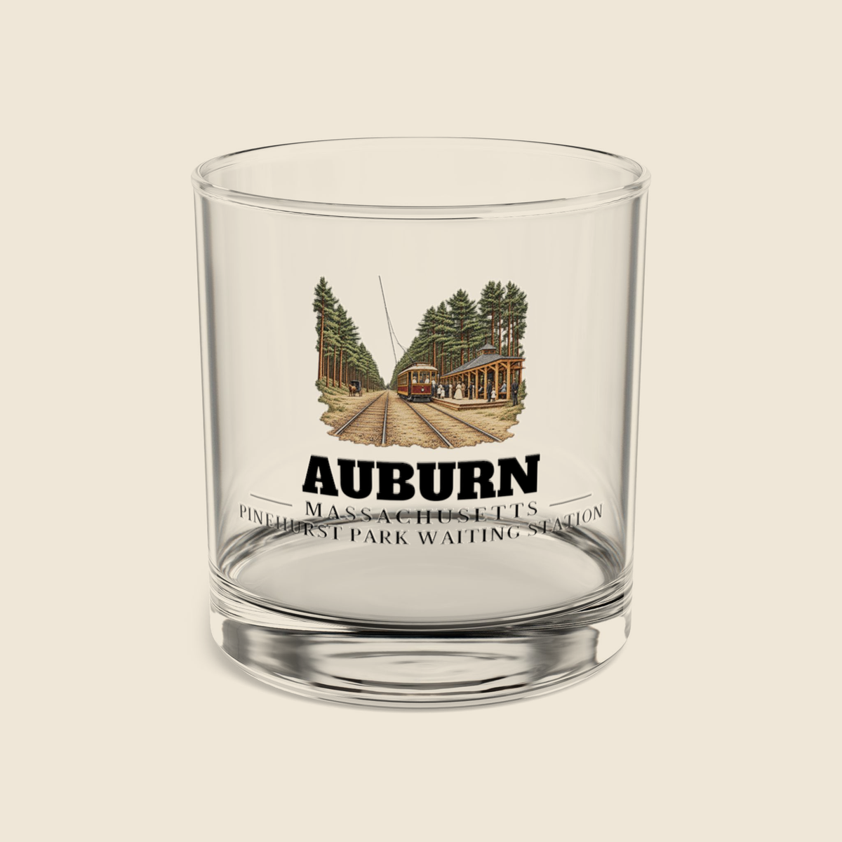 Auburn Pinehurst Park Waiting Station colored engraving on a clear 10 oz rocks glass with cream display background