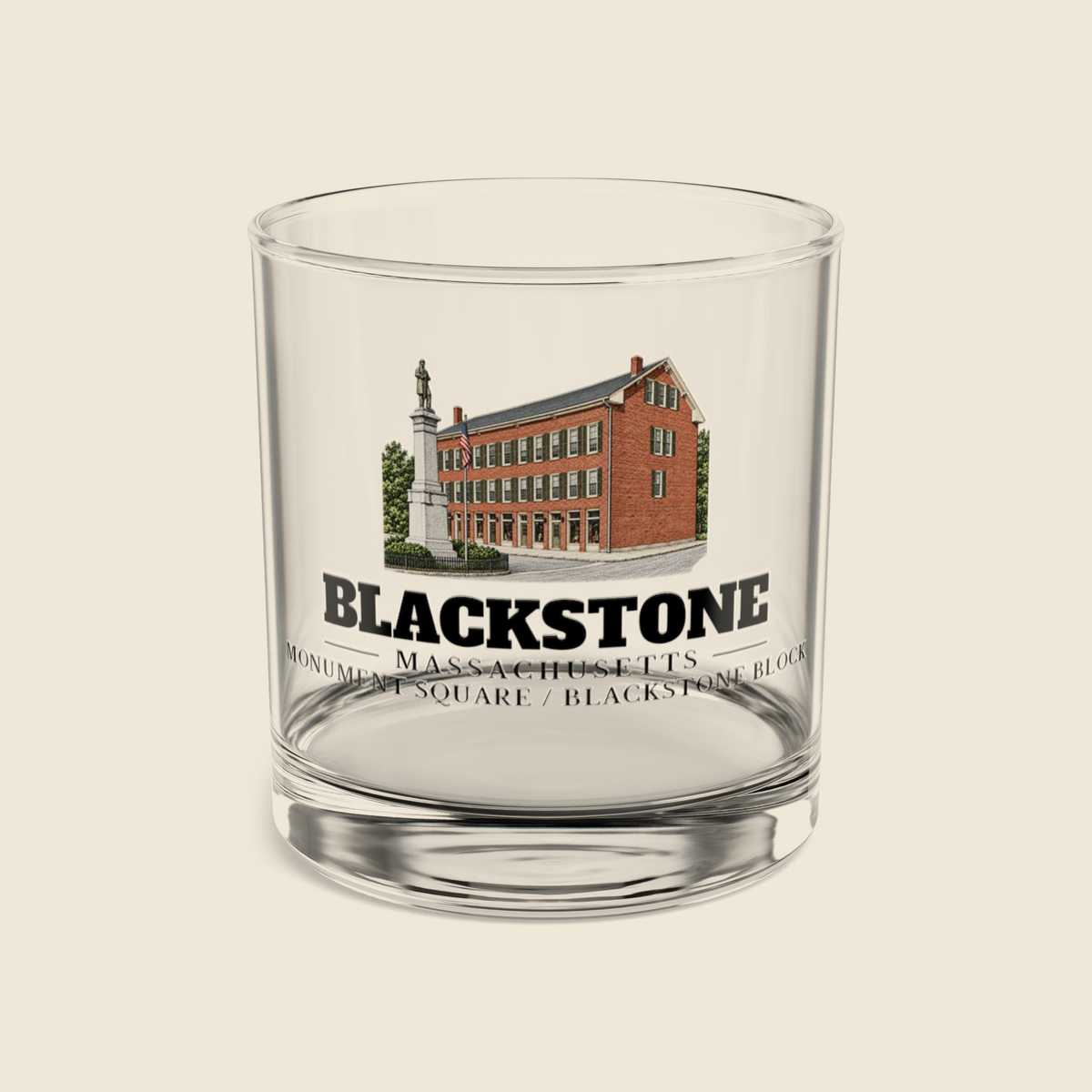 Blackstone Monument Square / Blackstone Block rocks glass with colored engraving, shown on a cream background