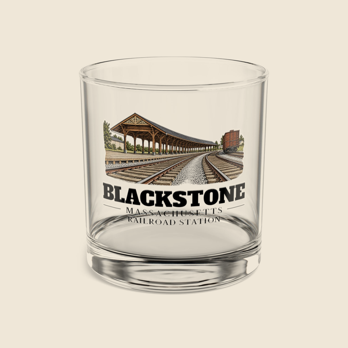 Blackstone Railroad Station rocks glass with colored engraving, shown on a cream background