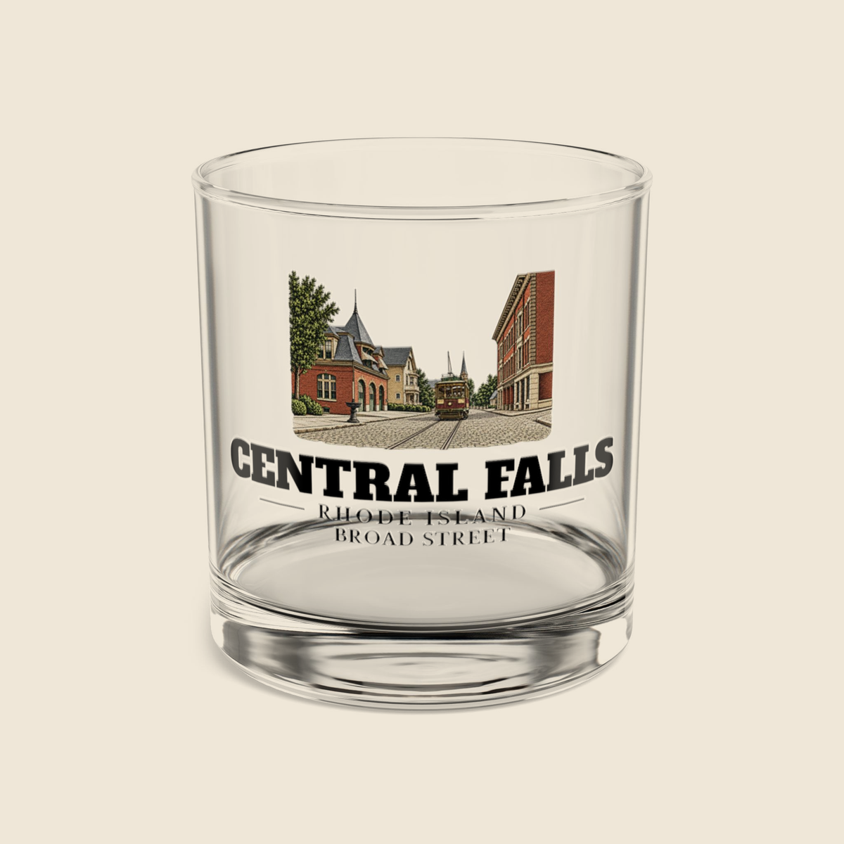 Central Falls Broad Street rocks glass with colored engraving, shown on a cream background