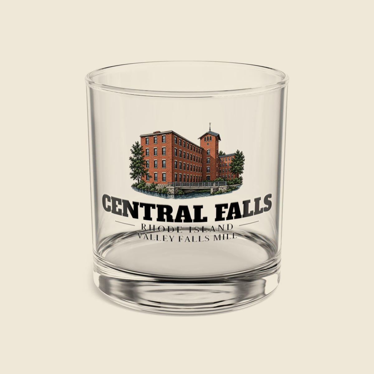 Central Falls Valley Falls Mill rocks glass with colored engraving, shown on a cream background