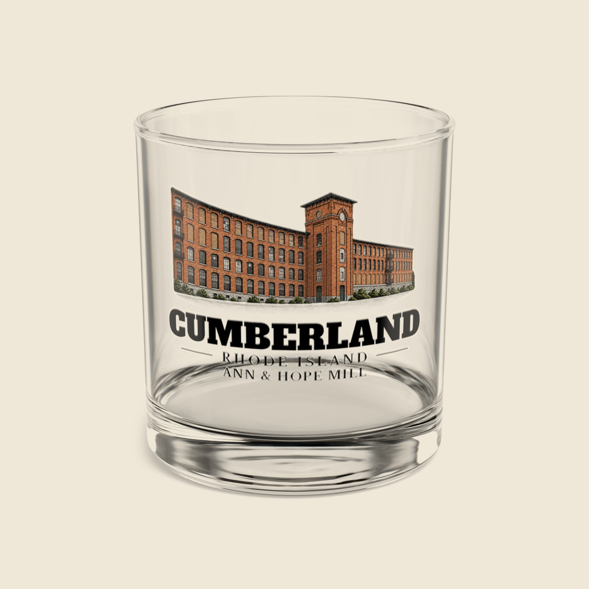 Cumberland Ann & Hope Mill rocks glass with colored engraving, shown on a cream background