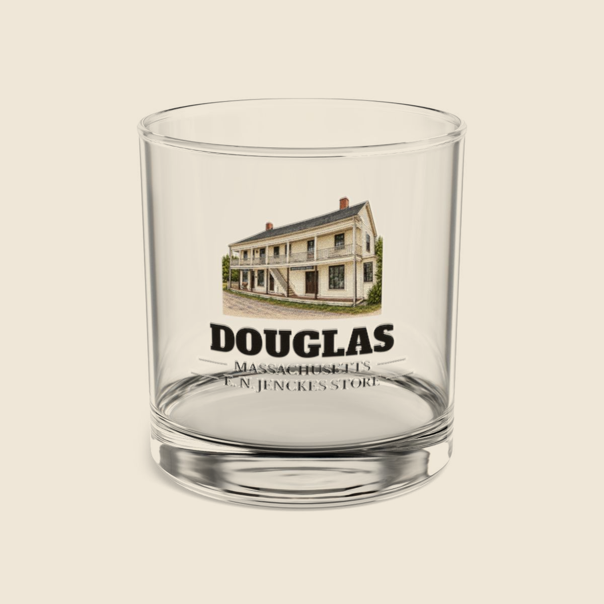 Douglas E. N. Jenckes Store colored engraving on a 10 oz clear rocks glass, cream display background