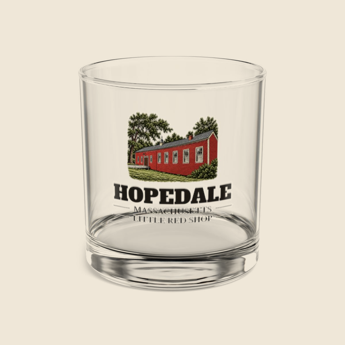 Hopedale Little Red Shop colored engraving on a 10 oz clear rocks glass, cream display background