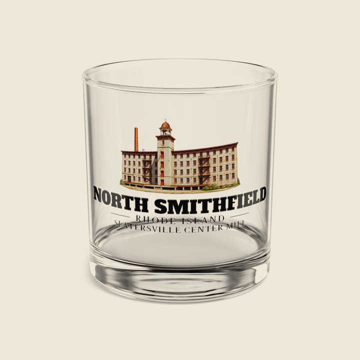 North Smithfield Slatersville Center Mill rocks glass with colored engraving, shown on a cream background