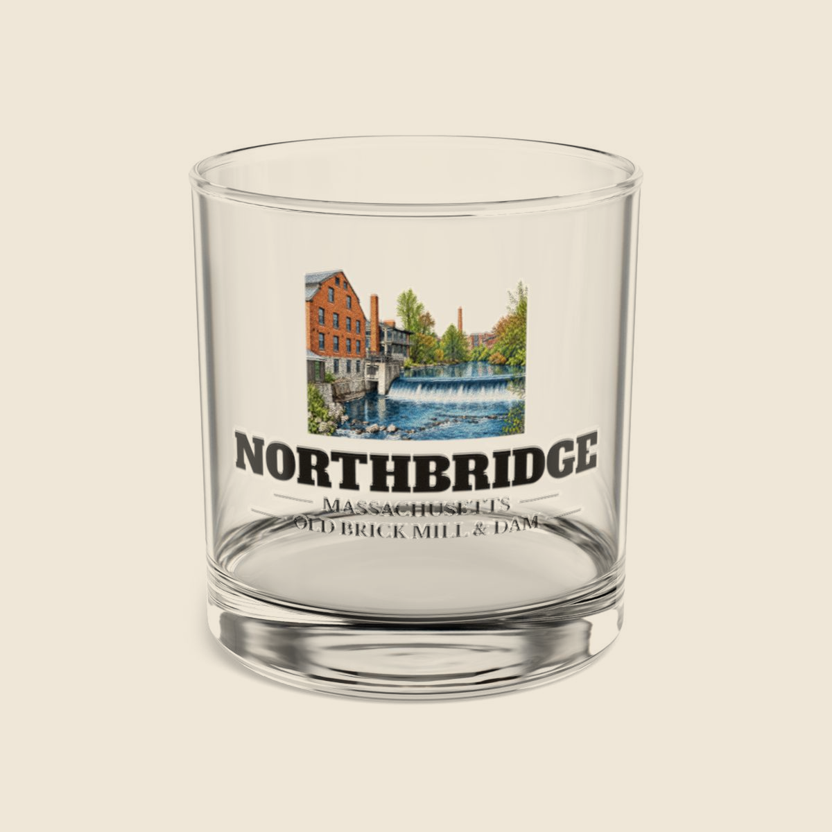 Northbridge Old Brick Mill and Mumford River Dam colored engraving on a 10 oz clear rocks glass, cream display background