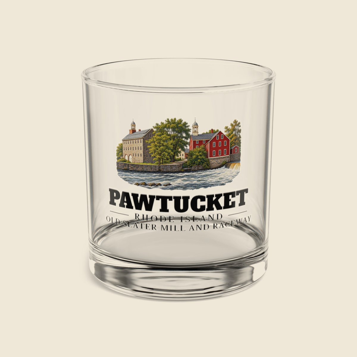 Pawtucket Old Slater Mill and Raceway rocks glass with colored engraving, shown on a cream background