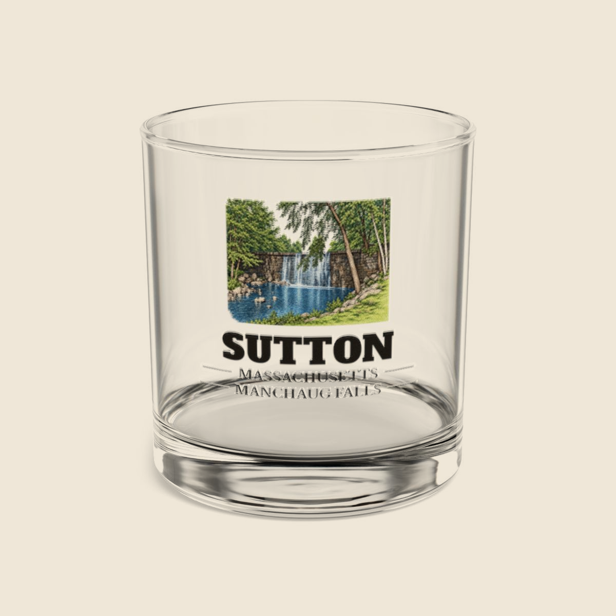 Sutton Manchaug Falls colored engraving on a 10 oz clear rocks glass, cream display background
