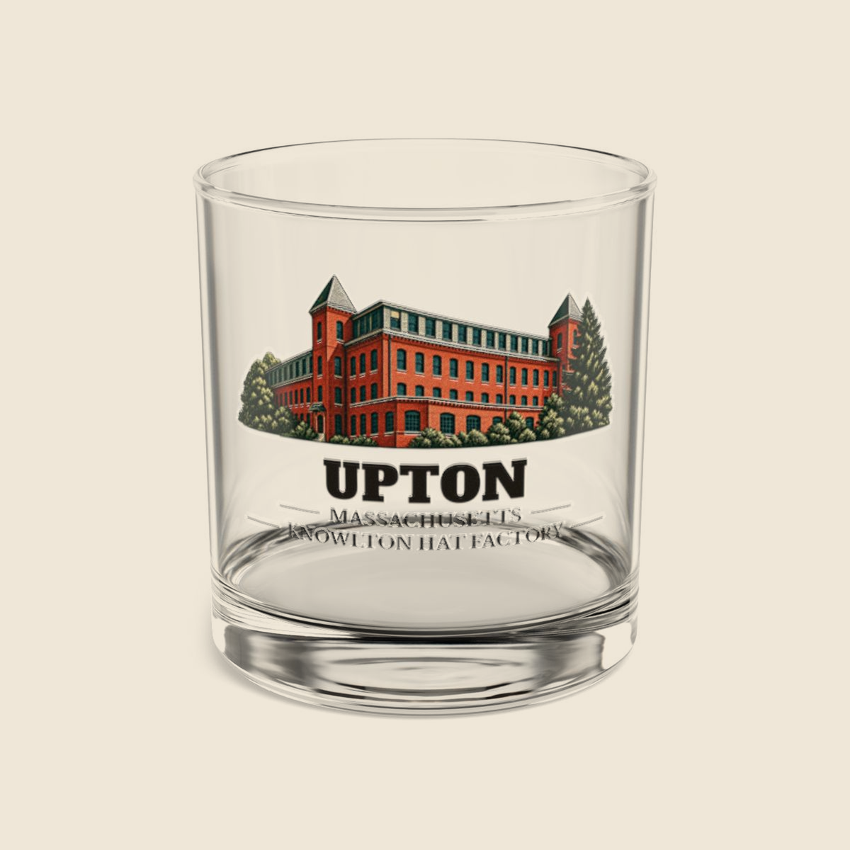 Upton Knowlton Hat Factory colored engraving on a 10 oz clear rocks glass, cream display background