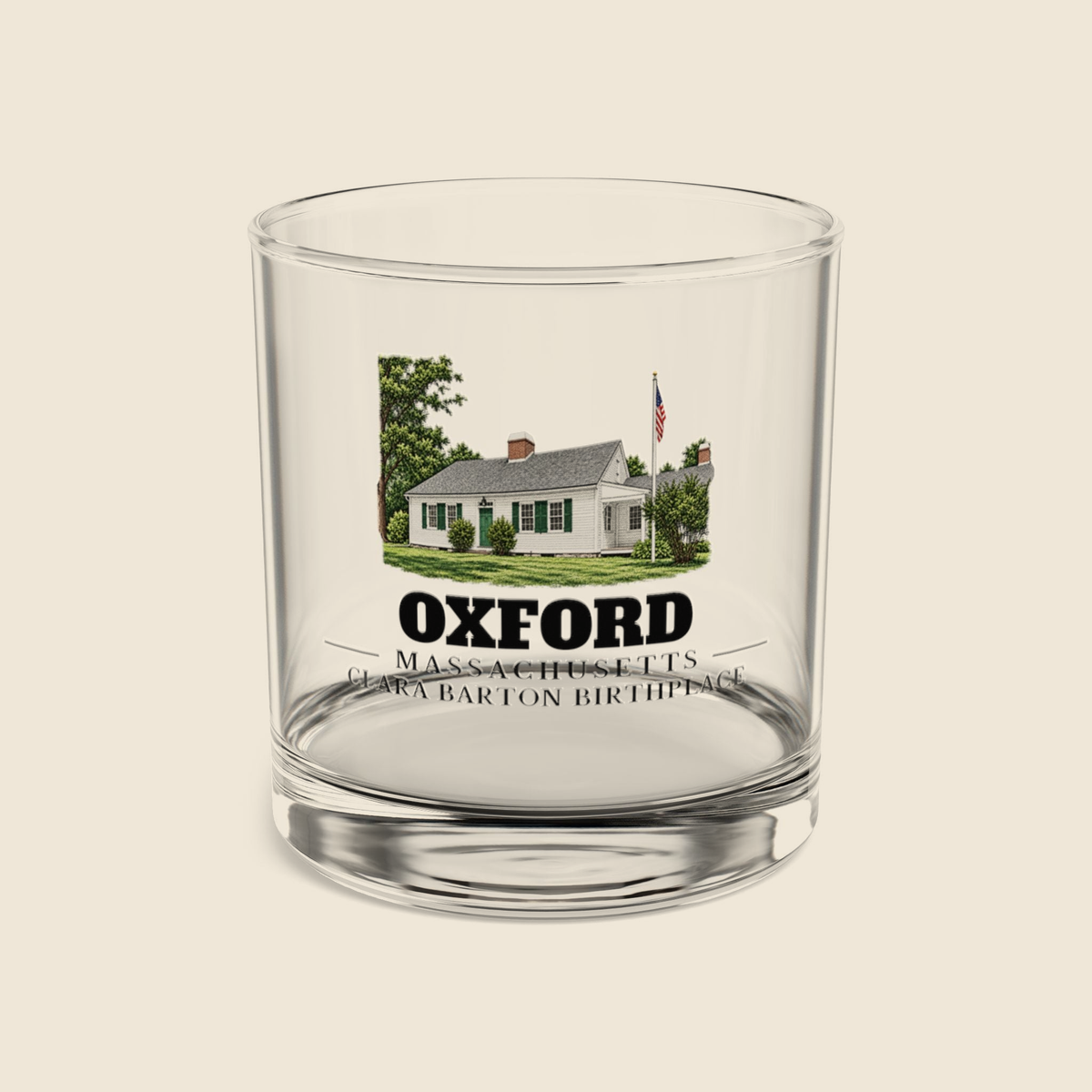 Oxford Clara Barton Birthplace colored engraving on a 10 oz clear rocks glass, cream display background