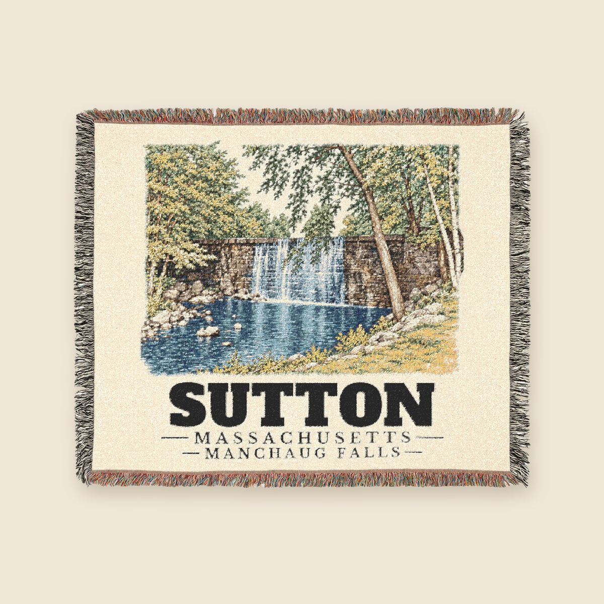 Manchaug Falls — Sutton, Massachusetts Woven Blanket woven blanket shown flat with fringe on a cream background