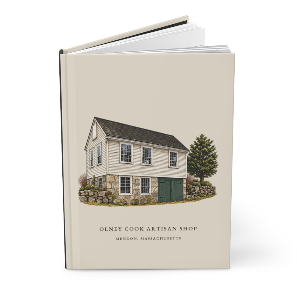 Mendon Olney Cook Artisan Shop journal mockup showing the illustrated cover