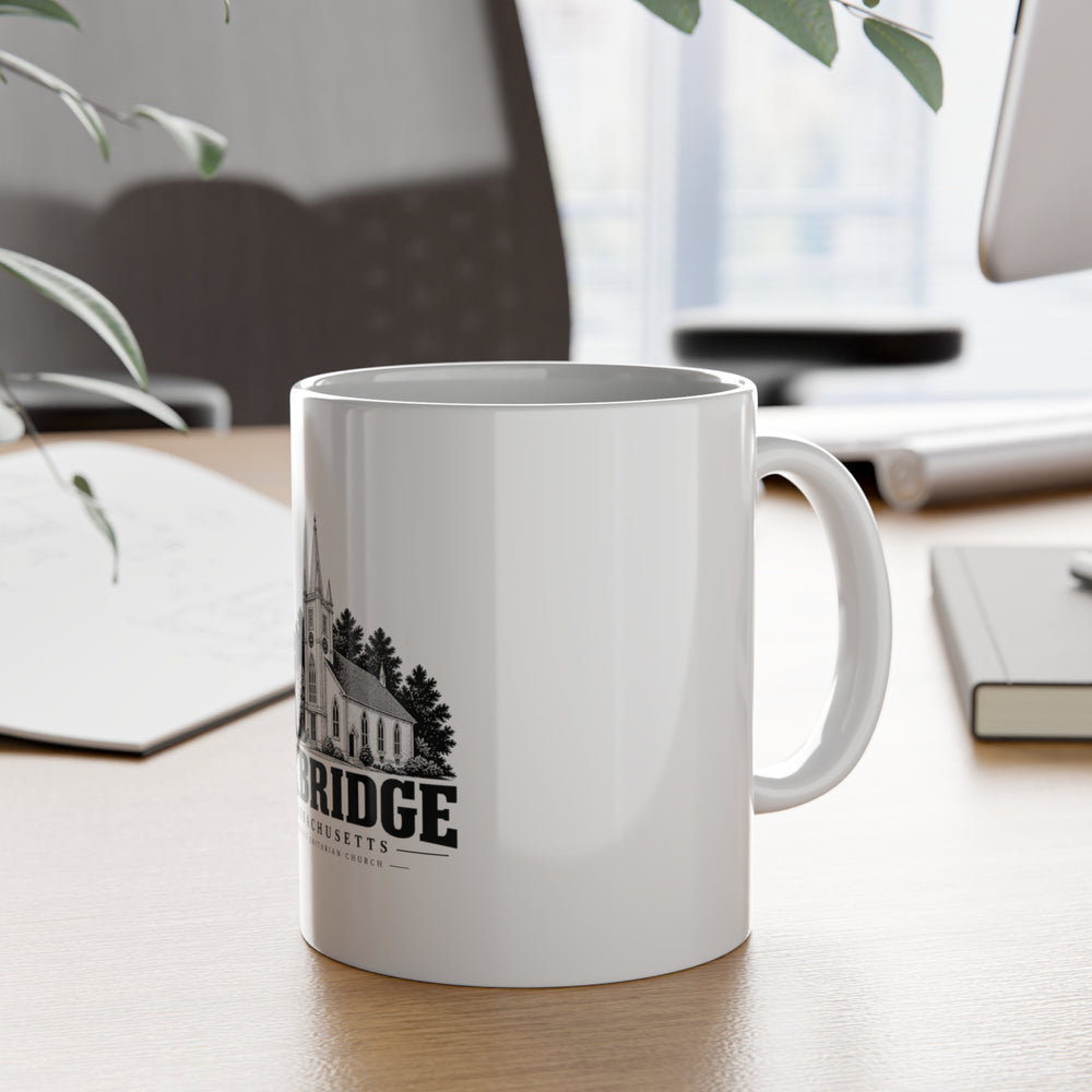 Uxbridge Unitarian Church 11 oz Ceramic Mug shown in a lifestyle setting